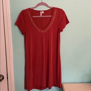 Francesca’s Red-orange Dress with Design